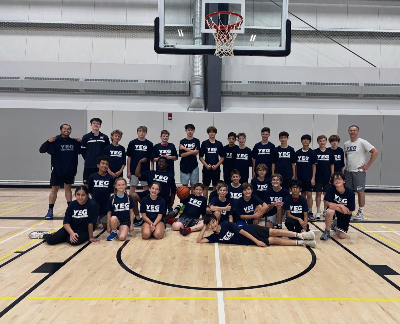Summer camp group photo in the gym